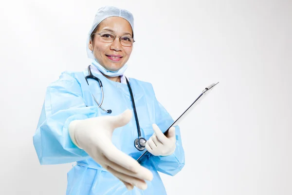 Female doctor handshaking — Stock Photo, Image