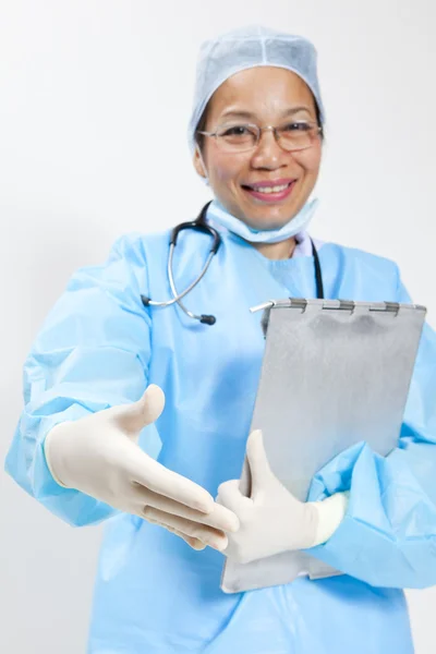 Female doctor handshaking — Stock Photo, Image