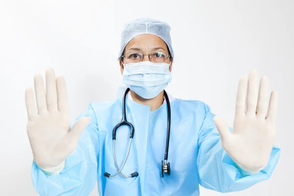 Medical female doctor showing stop gesture isolated on white — Stock Photo, Image