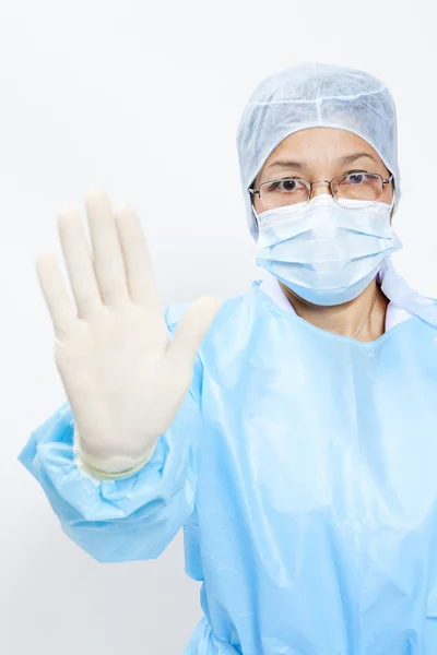 Medical female doctor showing stop gesture isolated on white — Stock Photo, Image