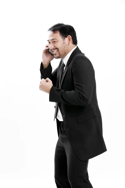 Mature business man talking on the phone over white background — Stock Photo, Image
