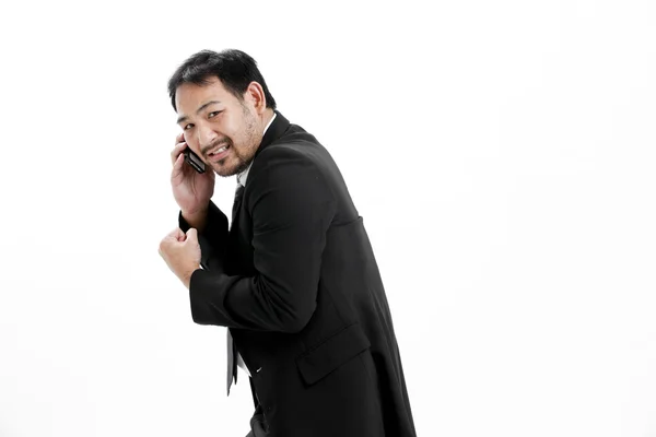 Retrato de un joven empresario feliz hablando por teléfono móvil —  Fotos de Stock