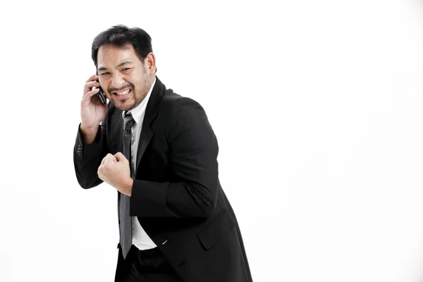 Retrato de un joven empresario feliz hablando por teléfono móvil — Foto de Stock