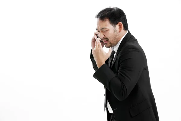 Supersticioso - Hombre de negocios asiático con los dedos cruzados sobre fondo blanco — Foto de Stock