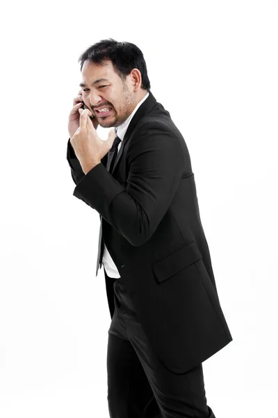 Superstitious - Asian business man with crossed fingers over white background — Stock Photo, Image