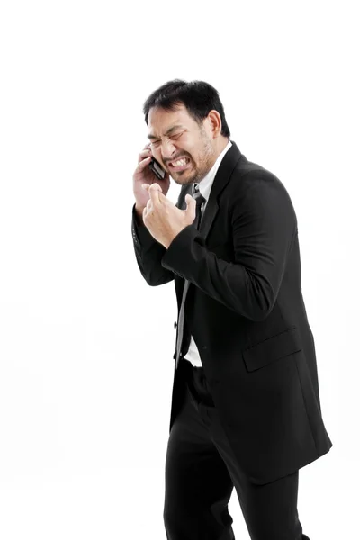 Supersticioso - Hombre de negocios asiático con los dedos cruzados sobre fondo blanco — Foto de Stock