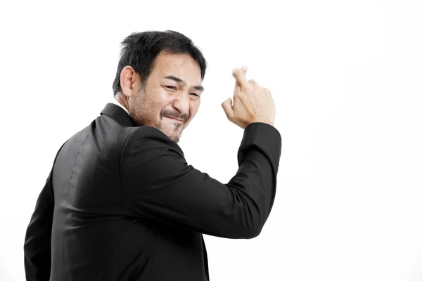 Superstitious - Asian business man with crossed fingers over white background — Stock Photo, Image