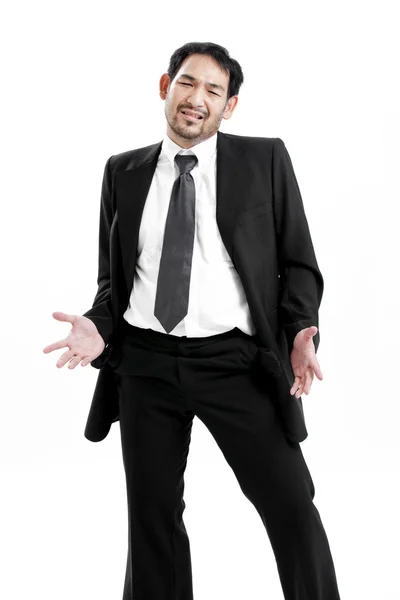 Businessman standing isolated on the white background and showing his empty pocket, turning his pocket inside out, no money — Stock Photo, Image