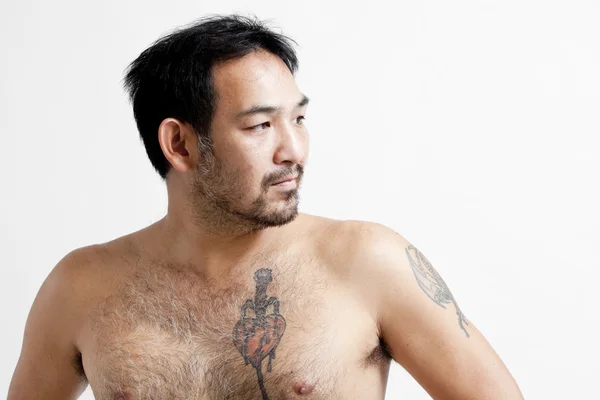 Portrait of asian man with naked body and tattoo — Stock Photo, Image
