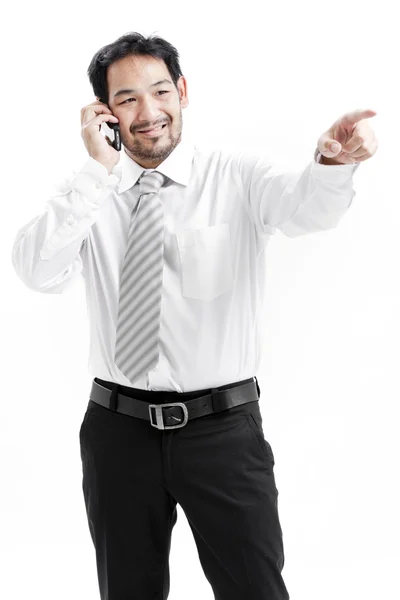 Retrato de un joven empresario feliz hablando por teléfono móvil —  Fotos de Stock