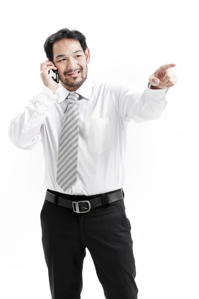 Retrato de um jovem empresário feliz falando no celular — Fotografia de Stock
