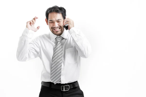 Supersticioso - Hombre de negocios asiático con los dedos cruzados sobre fondo blanco — Foto de Stock