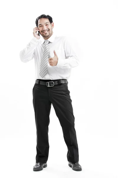白い背景で隔離の携帯電話で話している実業家 — ストック写真