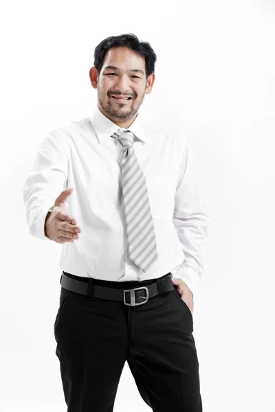 Businessman in suit giving an hand for handshake to seal the deal — Stock Photo, Image