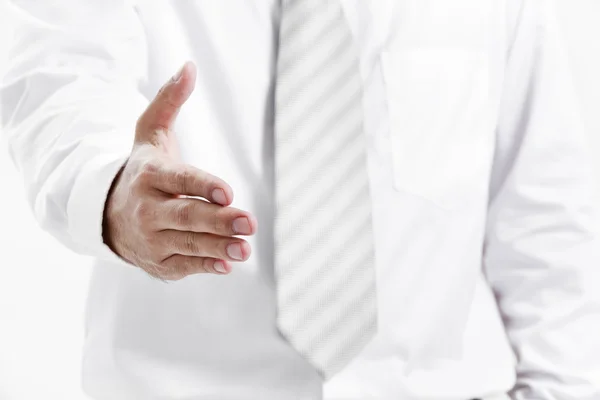 Podnikatel dává ruku pro handshake zaplombovat řešit — Stock fotografie