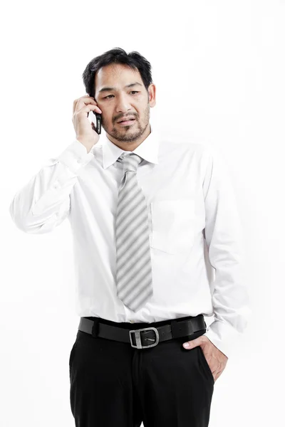 Businessman talking on his cellphone — Stock Photo, Image