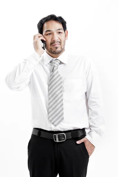 Empresario hablando por su celular — Foto de Stock