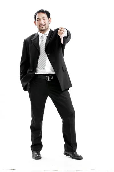 Businessman with thumb down gesture on white background — Stock Photo, Image