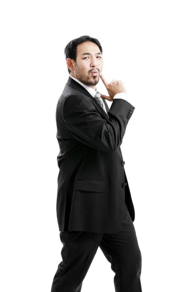 Businessman making a gun gesture. Isolated on white — Stock Photo, Image