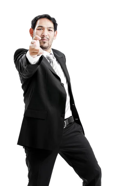 Un hombre de negocios haciendo un gesto de arma. Aislado sobre blanco — Foto de Stock