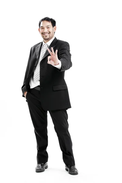 Portrait of hand showing ok sign against white background — Stock Photo, Image