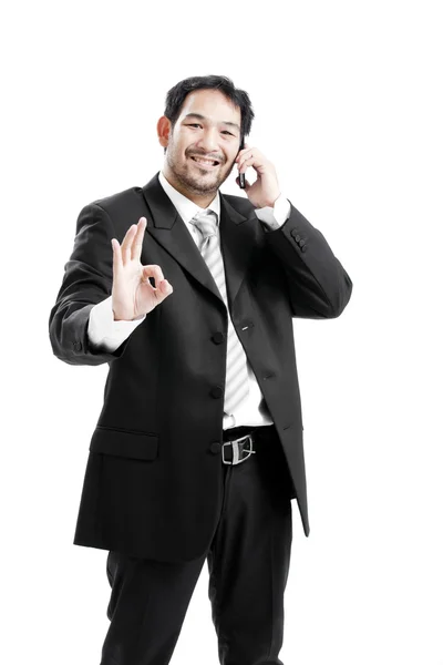 Businessman inside, giving ok sign — Stock Photo, Image