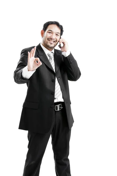 Businessman inside, giving ok sign — Stock Photo, Image