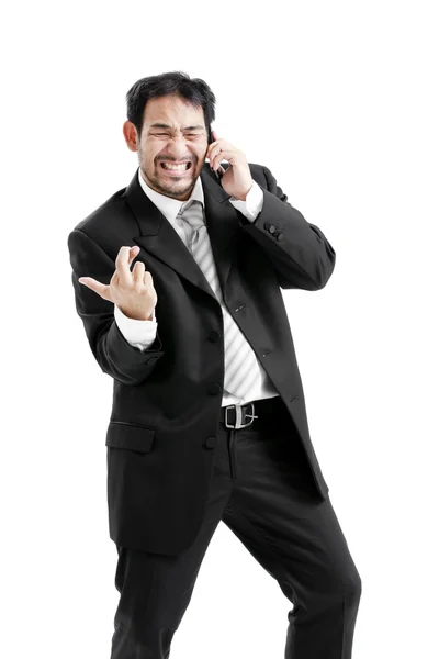 Superstitious - Asian business man with crossed fingers over white background — Stock Photo, Image