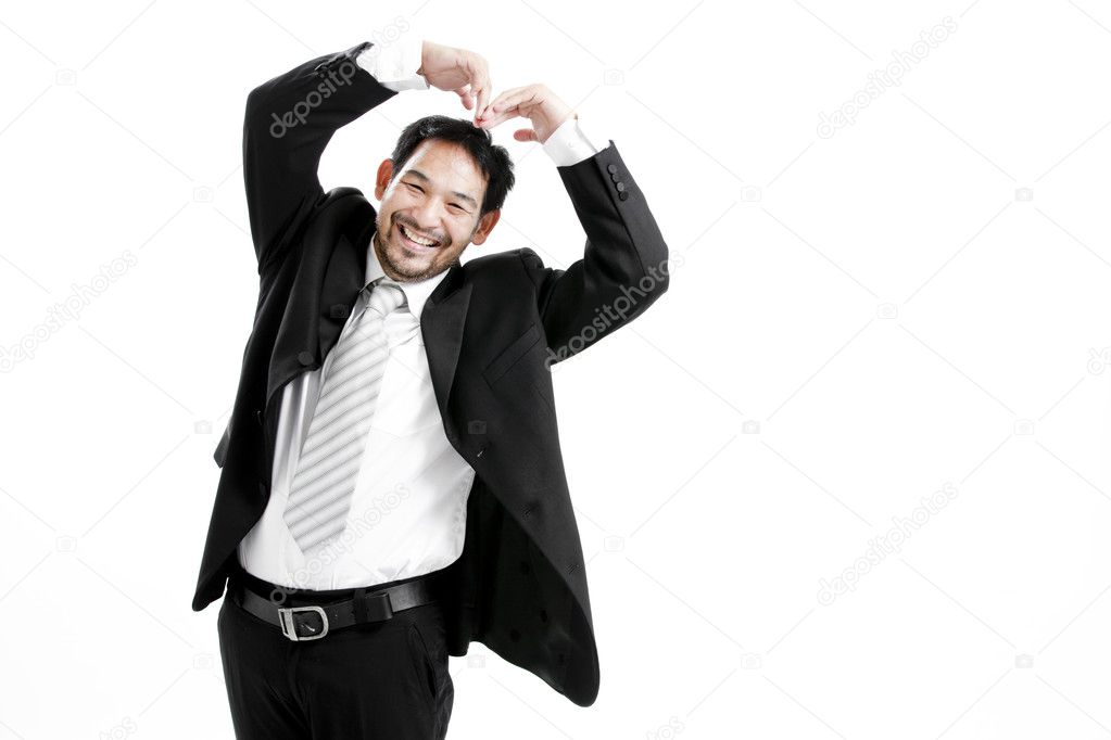 Portrait of hand showing love sign against white background