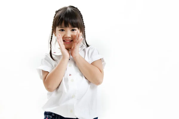 Little girl portrait with white shirt and blue jean on the white background — Stock Photo, Image