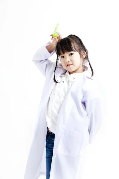A young asian girl having fun playing dress up as a doctor — Stock Photo, Image