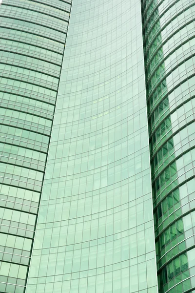 Modern green glass skyscraper perspective view — Stock Photo, Image