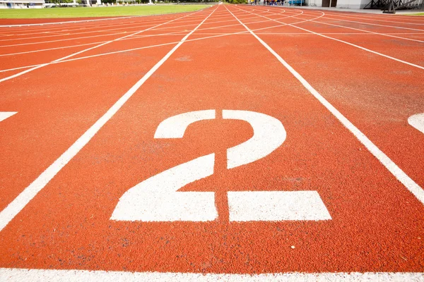 Tracks on red field . two — Stock Photo, Image