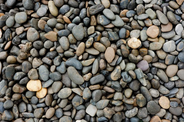 Soepele beach stenen achtergrond — Stockfoto