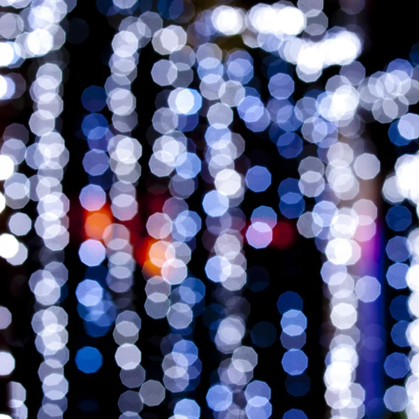 Luzes embaçadas em fundo azul rico . — Fotografia de Stock