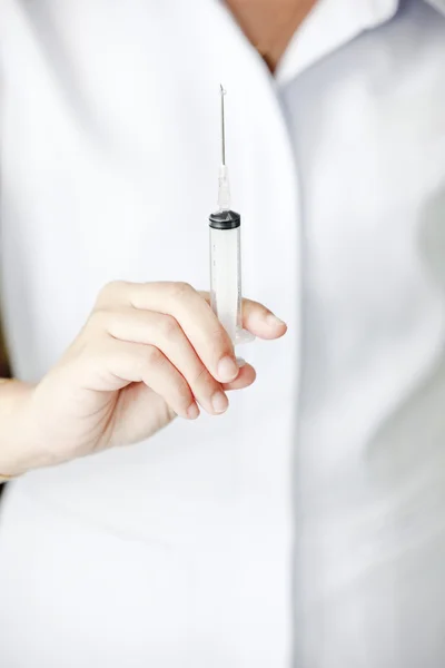 Nurse with syringe in hand — Stock Photo, Image