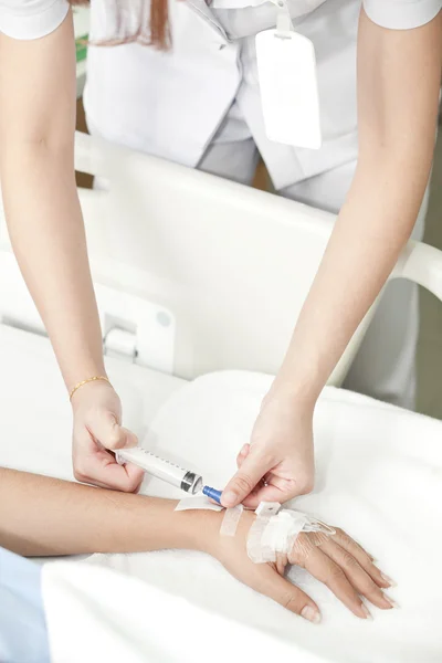 Injection in hand — Stock Photo, Image