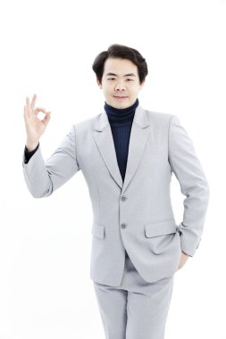 ok işareti veren işadamı dışında