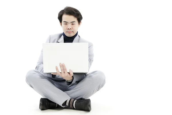 Confident businessman working on his computer — Stock Photo, Image