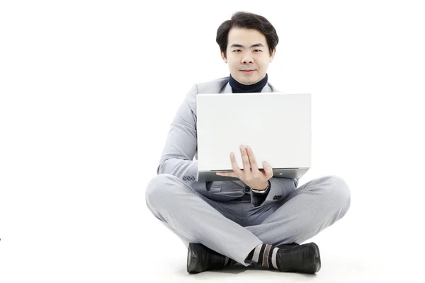 Confident businessman working on his computer — Stock Photo, Image