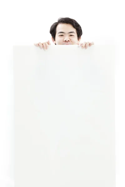 Ung mann med blank plakat – stockfoto