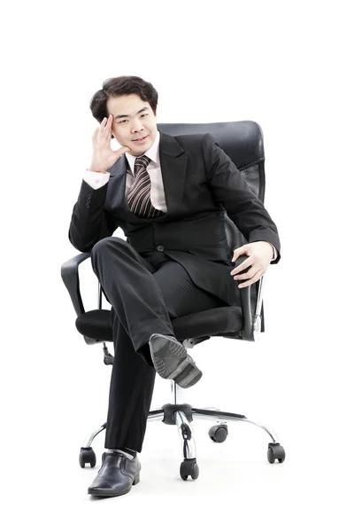 Portrait of handsome young thoughtful businessman isolated over white background — Stock Photo, Image