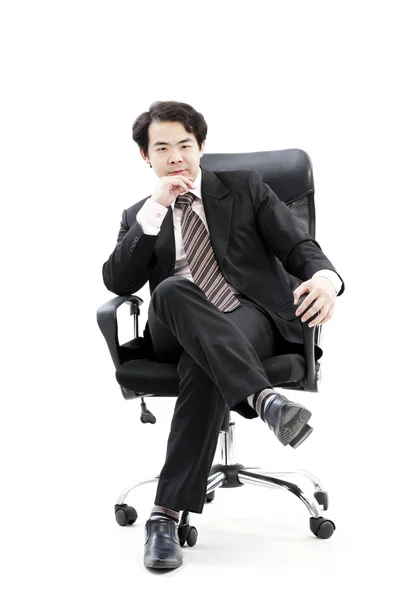 Portret van knappe jonge doordachte zakenman geïsoleerd op witte achtergrond — Stockfoto