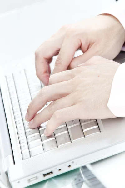 Close up view of male hand touching computer keyboard — Stock Photo, Image