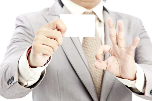 Retrato de hombre de negocios con tarjeta de nota en blanco — Foto de Stock