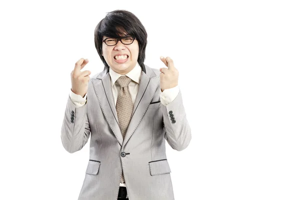Supersticioso - empreendedor com dedos cruzados sobre fundo branco — Fotografia de Stock