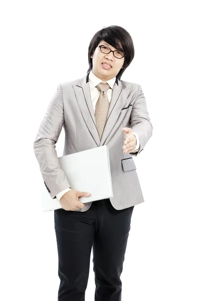Businessman holding on his computer — Stock Photo, Image