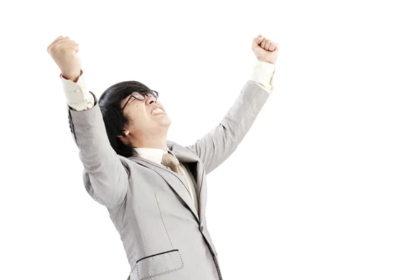 Hombre de negocios exitoso celebrando con los brazos levantados - aislado sobre un fondo blanco — Foto de Stock
