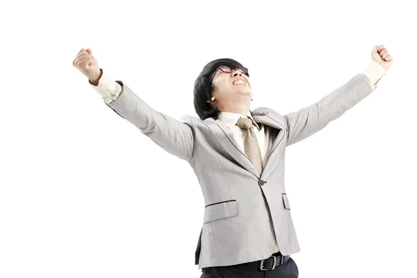 Успішний бізнесмен, який святкує руками вгору - ізольований на білому тлі — стокове фото