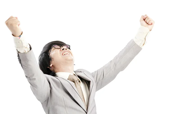 Uomo d'affari di successo che festeggia a braccia aperte isolato su uno sfondo bianco — Foto Stock